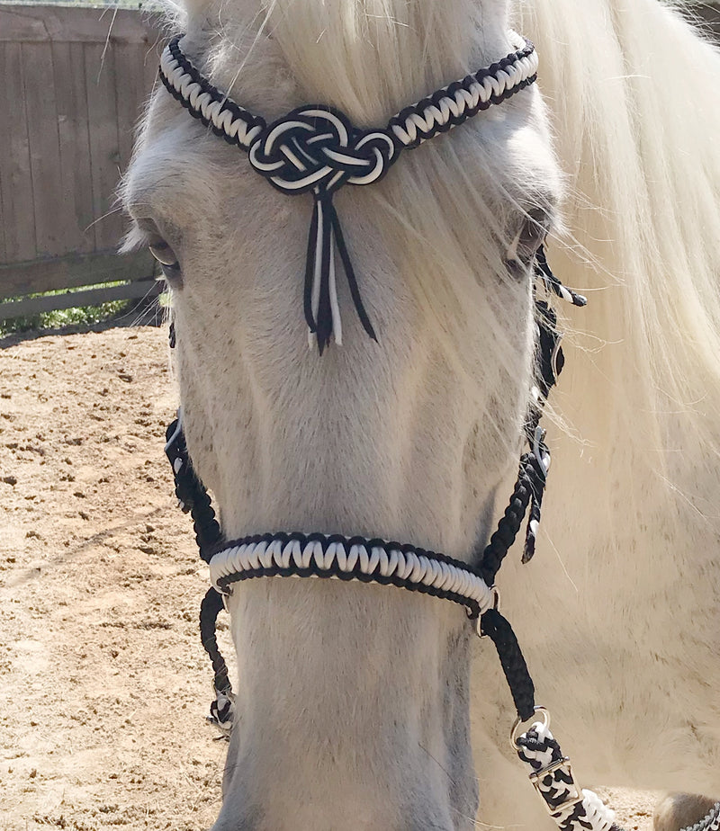 Snaffle bridle with decorative knot