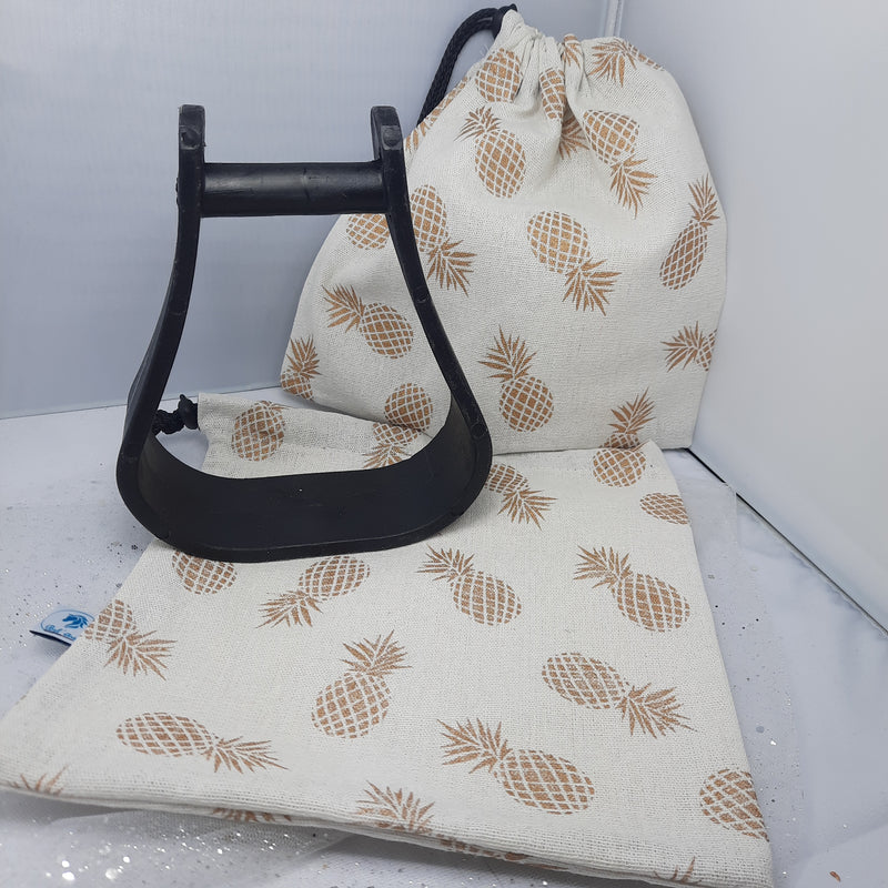 Gold pineapple stirrup bags/covers